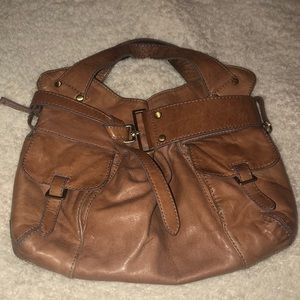 Kooba handle bag. Color is a pinkish tan